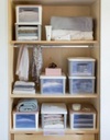 Organizza i tuoi vestiti con stile: Infinity Box Panna, il contenitore per armadio perfetto!