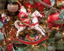 Babbo Natale con bambino su cavallo 29x11x34 cm